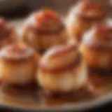 Perfectly cooked bacon wrapped scallops glistening with a savory glaze