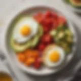 Colorful plated breakfast featuring eggs, avocado, and vegetables