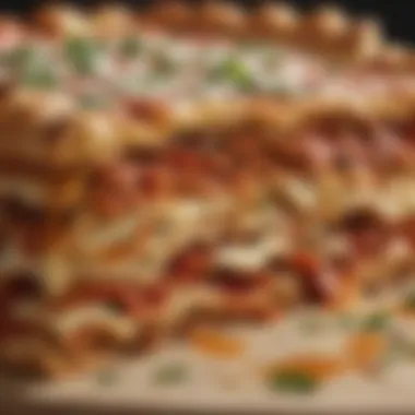 A close-up of layered pizza lasagna showcasing ingredients