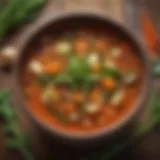 A vibrant bowl of vegetable soup with fresh herbs