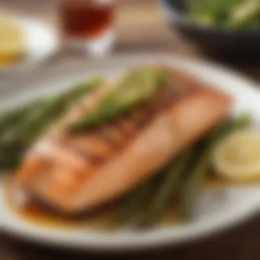 A beautifully arranged plate of grilled salmon with asparagus and lemon