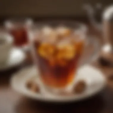 A close-up of a tea cup filled with decaffeinated sweet tea surrounded by sweeteners