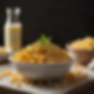 A vibrant bowl of elbow mac and cheese topped with breadcrumbs and herbs.