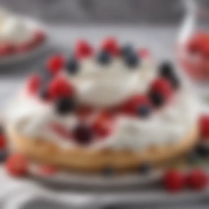 A delicate pavlova topped with whipped cream and mixed berries, perfect for brunch.