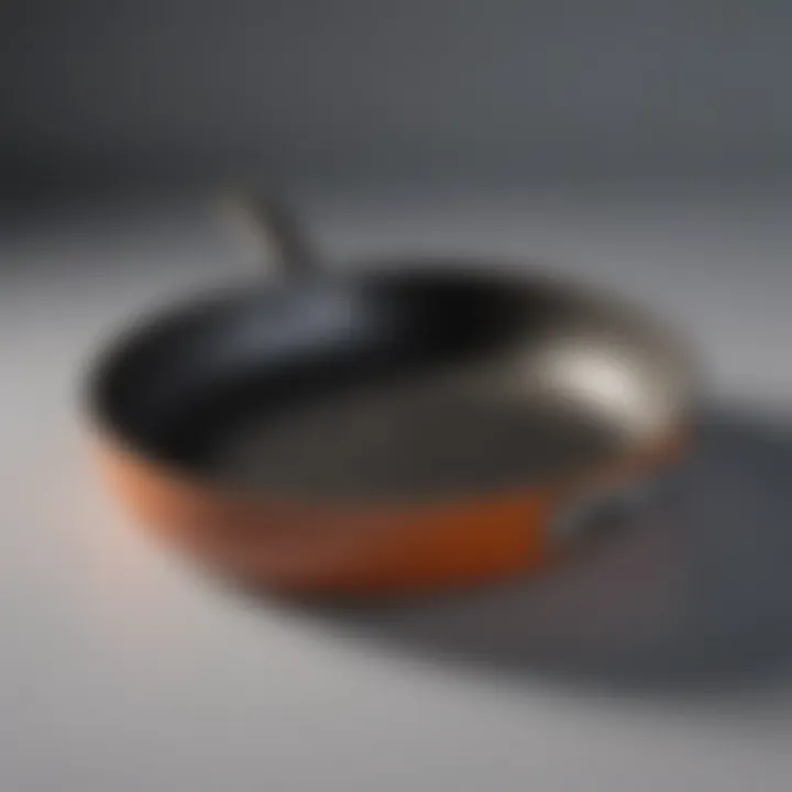 Close-up of a ceramic frying pan with a smooth surface, highlighting its durability.