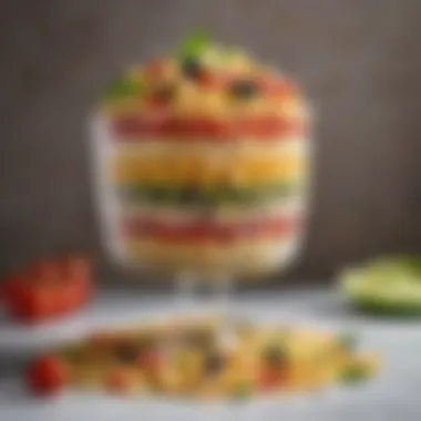 A visually appealing pasta salad arranged in layers with colorful ingredients