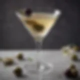 A perfectly crafted dirty vodka martini garnished with olives