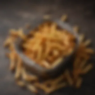 Delicious crispy fries prepared in a small fryer