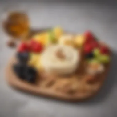 A decadent cheese platter featuring various cheese slices paired with fruits and nuts