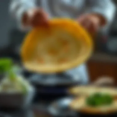 A chef skillfully flipping a vegan crepe on a stovetop, highlighting the art of crepe making.