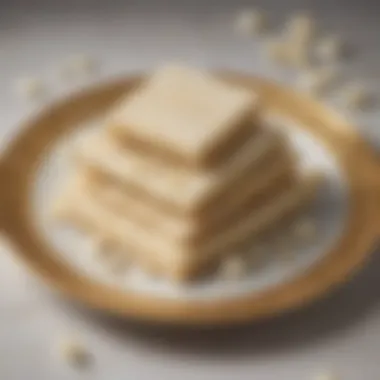 Elegant Presentation of White Chocolate Covered Matzo An elegant presentation of white chocolate covered matzo arranged on a decorative platter.