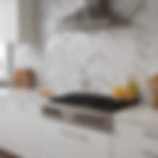 Elegant white and gray chevron backsplash in a modern kitchen