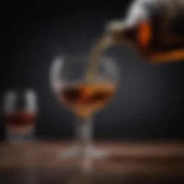 Pouring the Richness of Maestro Dobel Anejo Pouring Maestro Dobel Anejo into a glass