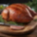 A beautifully glazed ham resting on a wooden board