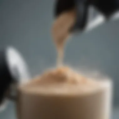 Scooping Whey Protein Powder A close-up of whey protein powder being scooped into a blender