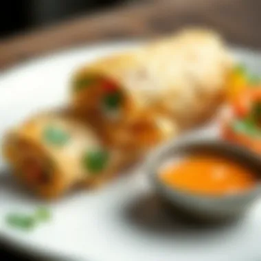 A beautifully plated rollito with dipping sauce and fresh herbs