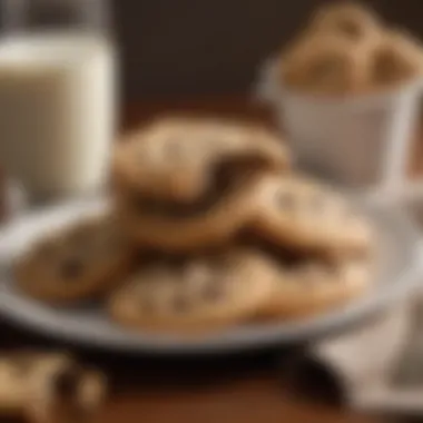 An appealing display of Swerve chocolate chip cookies served on a decorative plate with a glass of milk.