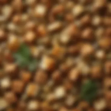 A close-up of a hearty stuffing mix featuring herbs and bread cubes