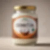 A close-up view of high-quality organic coconut oil in a glass jar, showcasing its creamy texture and purity.