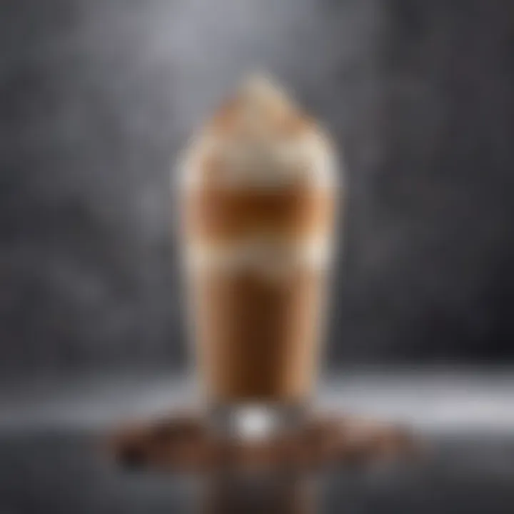 A visually appealing glass of iced cappuccino with foam artistry.