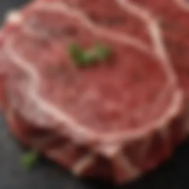 Marbled Ribeye Steak Texture Close-up of marbled ribeye steak showcasing its rich texture