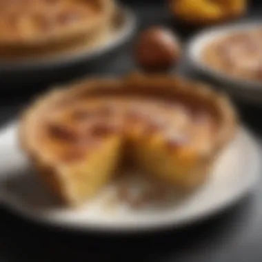 A close-up shot of a golden-brown quiche, highlighting a flaky crust.