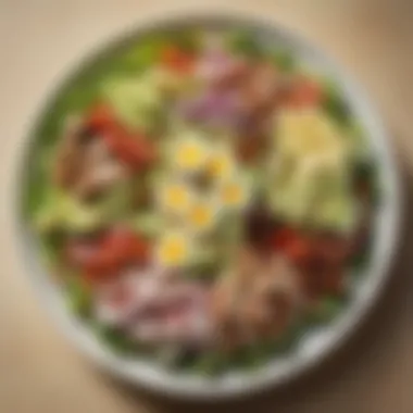 Presentation of Cobb Salad A beautifully arranged plate of Cobb salad, emphasizing the importance of presentation.