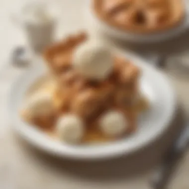 A slice of apple pie served on a plate with a scoop of ice cream